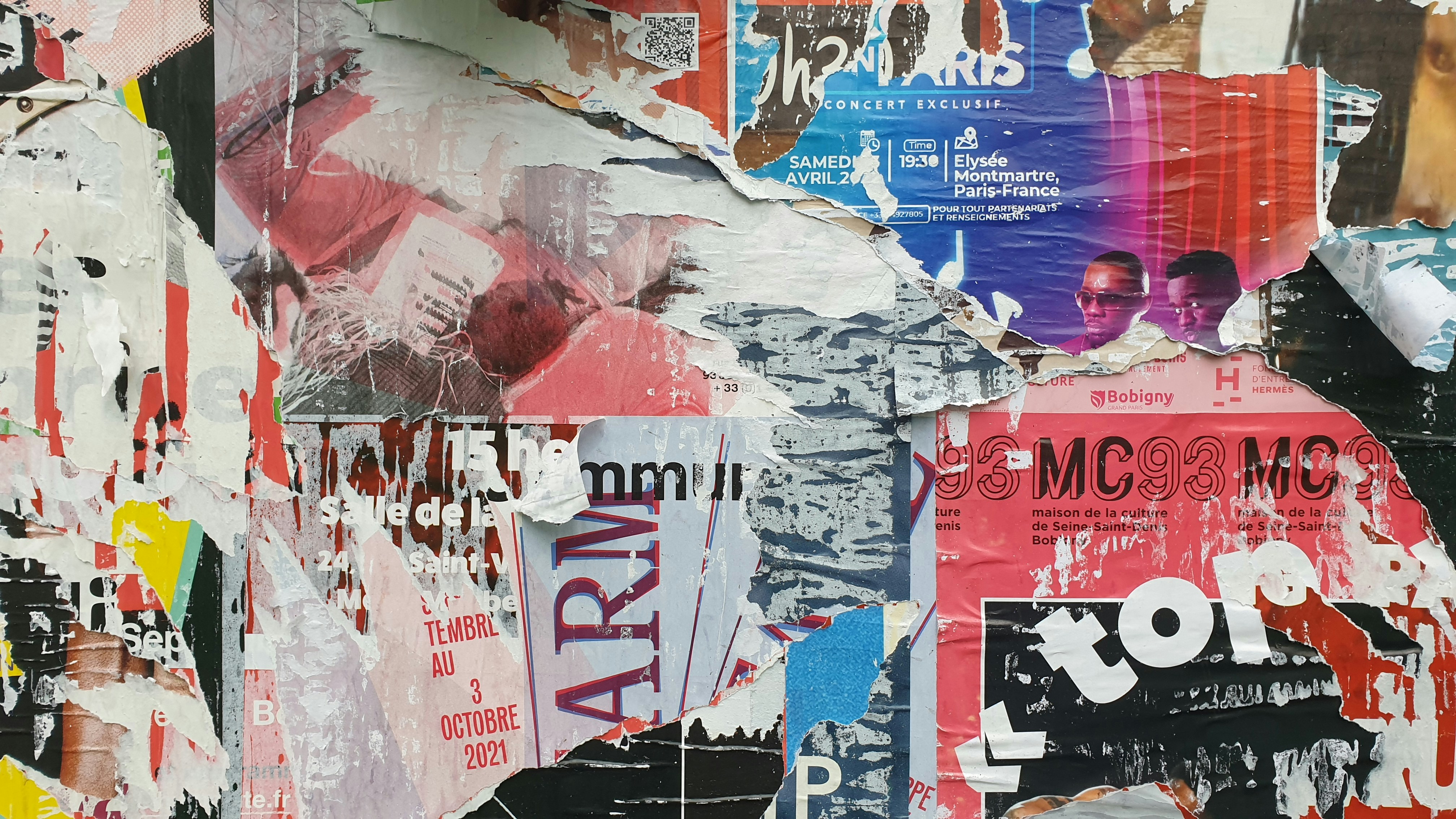 Urban Fragments - Mixed media collage incorporating newspaper clippings, acrylic paint, and metal elements depicting modern city life